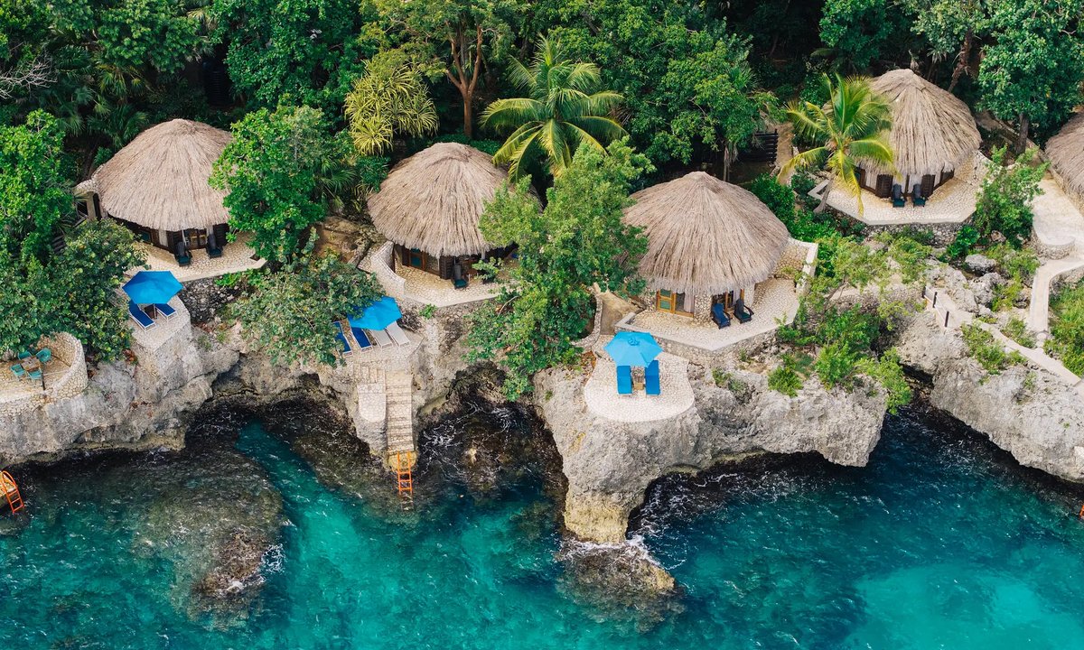 Rockhouse Hotel Negril Jamaica cliff pool thatched cottage